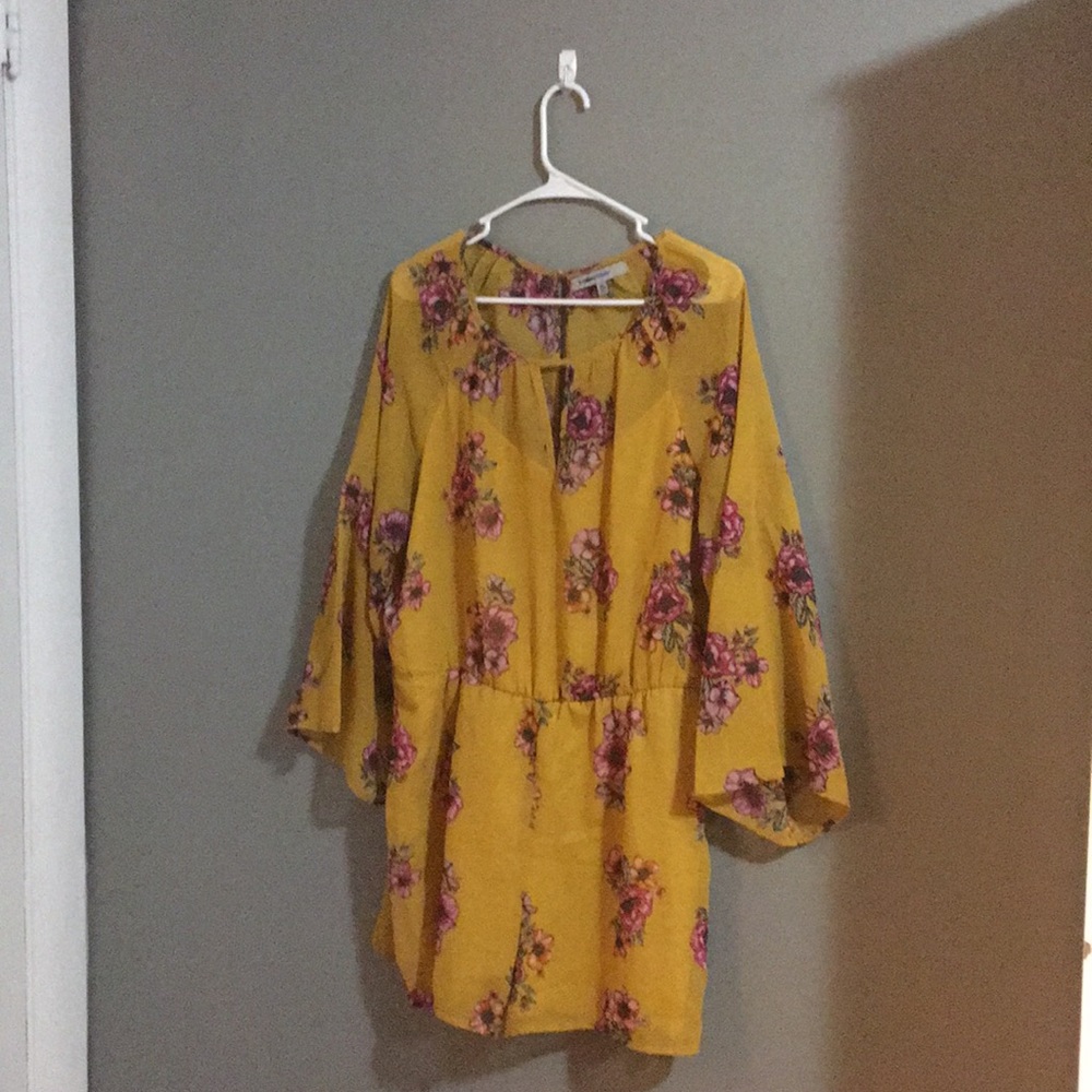 Yellow romper with pink floral print